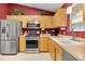 Updated kitchen features stainless steel appliances, tile flooring and backsplash at 8377 Se 177Th Bartram Loop, The Villages, FL 32162
