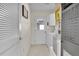 Functional laundry room with washer, dryer, and access to the garage at 8377 Se 177Th Bartram Loop, The Villages, FL 32162