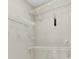 Walk-in closet with custom adjustable shelving at 8377 Se 177Th Bartram Loop, The Villages, FL 32162