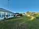Expansive backyard featuring a gazebo with patio set; plenty of room for activities at 8850 Se 156Th St, Summerfield, FL 34491