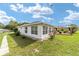Well-kept backyard featuring a gazebo, offering a serene retreat and plenty of space at 8850 Se 156Th St, Summerfield, FL 34491