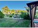 Beautiful backyard with a decorative garden and a covered patio at 8850 Se 156Th St, Summerfield, FL 34491