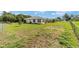 Spacious backyard featuring lush greenery and a gazebo, perfect for outdoor enjoyment at 8850 Se 156Th St, Summerfield, FL 34491