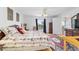 Inviting primary bedroom boasting hardwood floors, vintage decor, and an ensuite bathroom at 8850 Se 156Th St, Summerfield, FL 34491