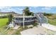 Backyard showcasing the above-ground pool, pump, and deck access with steps at 8850 Se 156Th St, Summerfield, FL 34491