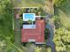 Overhead view of a private pool and garden area with a lovely landscaped garden providing a relaxing backyard retreat at 9269 Silver Lake Dr, Leesburg, FL 34788