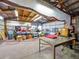 Large garage interior with ample lighting, ideal for storage and projects at 9269 Silver Lake Dr, Leesburg, FL 34788