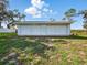 A large two-door garage provides ample space for vehicles and storage at 9269 Silver Lake Dr, Leesburg, FL 34788