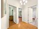 Bright hallway showcasing access to bedrooms and bathrooms at 992 Davit Pl, The Villages, FL 32162