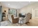 Relaxing living room with ample natural light, comfortable seating, and an open feel at 10046 Ketch Kay Ln, Oxford, FL 34484