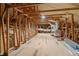 Spacious unfinished attic area with exposed wooden beams, subflooring, and ductwork at 1042 Sugarloaf Key Loop, Lady Lake, FL 32159