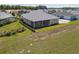 Aerial view of backyard with soil area and landscaping that offers potential for outdoor enjoyment at 1042 Sugarloaf Key Loop, Lady Lake, FL 32159