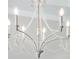 Close-up of an ornate chandelier with vintage-style bulbs and delicate bead accents at 1042 Sugarloaf Key Loop, Lady Lake, FL 32159