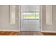 The screened in porch offers ample space for seating and enjoying the outdoors at 1042 Sugarloaf Key Loop, Lady Lake, FL 32159