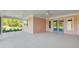 The screened in porch is perfect for outdoor entertaining and relaxation at 1042 Sugarloaf Key Loop, Lady Lake, FL 32159