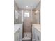Contemporary bathroom shower with glass doors and modern showerhead at 1065 Peebles St, Orlando, FL 32827