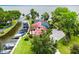 Breathtaking aerial view of the house featuring boat docks and access to the lake at 112 Waterwood Dr, Yalaha, FL 34797