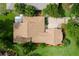 Birds eye view of the home showing the roof and spacious surrounding property at 112 Waterwood Dr, Yalaha, FL 34797