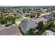 Gorgeous aerial view of a well-maintained home in a desirable neighborhood, featuring lush landscaping and beautiful surroundings at 1122 Magrath Way, The Villages, FL 32162