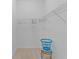 Walk-in closet with wire shelving and a blue laundry basket at 1122 Magrath Way, The Villages, FL 32162
