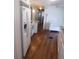 Bright kitchen features wood floors, stainless appliances, and a breakfast bar at 114 Azalea Trl, Leesburg, FL 34748