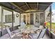 Relaxing enclosed patio with comfortable seating and an inviting atmosphere at 1214 Loch Rannoch Ct, Leesburg, FL 34788