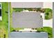Aerial view of the roof and landscaping of a well-maintained home at 1225 Eunice St, The Villages, FL 34762