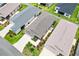 Aerial view of homes in a well-maintained neighborhood at 1225 Eunice St, The Villages, FL 34762