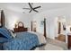 Relaxing main bedroom suite with ensuite bathroom and neutral color scheme at 1225 Eunice St, The Villages, FL 34762