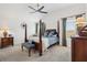 Spacious bedroom with a four-poster bed, and ample natural light at 1225 Eunice St, The Villages, FL 34762