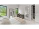 Neutral bedroom with simple decor, natural lighting and backyard views at 16320 Pendio Dr, Bella Collina, FL 34756