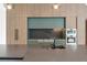Close-up of modern kitchen island with built in sink and high-end stainless steel appliances at 16320 Pendio Dr, Bella Collina, FL 34756