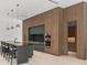 Contemporary kitchen with modern appliances, sleek cabinetry, and a spacious island with bar seating at 16320 Pendio Dr, Bella Collina, FL 34756
