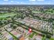 An aerial view showing the home's prime location within a golf course community at 17461 Se 82Nd Albemarle Ave, The Villages, FL 32162