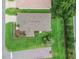 An aerial view of the home with a well maintained roof and nicely manicured lawn at 17461 Se 82Nd Albemarle Ave, The Villages, FL 32162