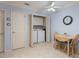 Convenient laundry area, behind bi-fold doors, with washer, dryer and extra storage at 17461 Se 82Nd Albemarle Ave, The Villages, FL 32162