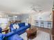 Open-concept living room leading to the dining area and kitchen, creating a welcoming space at 17461 Se 82Nd Albemarle Ave, The Villages, FL 32162