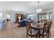 Open-concept living and dining area with lots of space for entertaining at 17461 Se 82Nd Albemarle Ave, The Villages, FL 32162