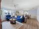 Bright and airy living space leading to the dining area, ideal for gatherings at 17461 Se 82Nd Albemarle Ave, The Villages, FL 32162