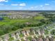 Aerial view of the property highlighting its location, surrounding landscape, and residential neighborhood at 1824 Forest Glen Dr, Fruitland Park, FL 34731