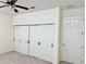 Bedroom with closet and bi-fold doors, offering ample storage space at 20936 Royal St Georges Ln, Leesburg, FL 34748