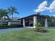 Well-maintained building exterior with lush landscaping, offering a welcoming and attractive entrance at 20936 Royal St Georges Ln, Leesburg, FL 34748