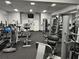 Well-equipped gym with modern cardio and weight-training equipment for a complete workout experience at 20936 Royal St Georges Ln, Leesburg, FL 34748