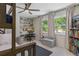 Comfortable bedroom with built-in shelving and desk at 2214 Dogwood Cir, Mount Dora, FL 32757