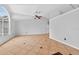 Spacious living room with beautiful tile flooring, high ceilings and flooded with natural light from large windows at 2705 Bayview Dr, Eustis, FL 32726
