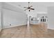 Spacious living room featuring neutral walls, tile flooring, and an open floor plan, perfect for entertaining and Gathering gatherings at 2705 Bayview Dr, Eustis, FL 32726