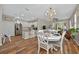 Open concept design flows from the kitchen into the dining and living areas at 27121 White Plains Way, Leesburg, FL 34748