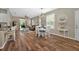 Inviting open floor plan featuring dining and living areas with seamless flow and natural light at 27121 White Plains Way, Leesburg, FL 34748