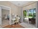 Dedicated office with a desk and a view of the backyard lanai at 27121 White Plains Way, Leesburg, FL 34748
