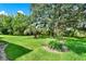 Expansive backyard features mature trees and landscaping at 27302 Stoney Brook Dr, Leesburg, FL 34748